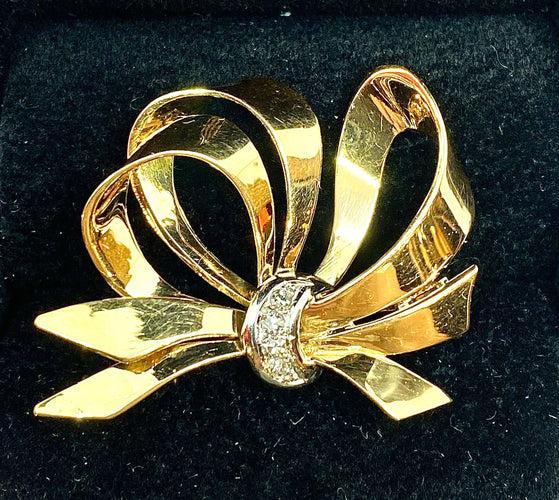 Broche Broche noeud diamants 58 Facettes