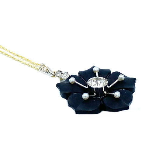 Pendentif Pendentif vers 1900 or, onyx et diamants 58 Facettes