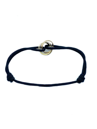 Bracelet CARTIER. Collection Trinity, bracelet cordon et 3 ors 58 Facettes