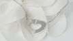 Collier Collier Cartier Symboles cœur en or blanc 58 Facettes