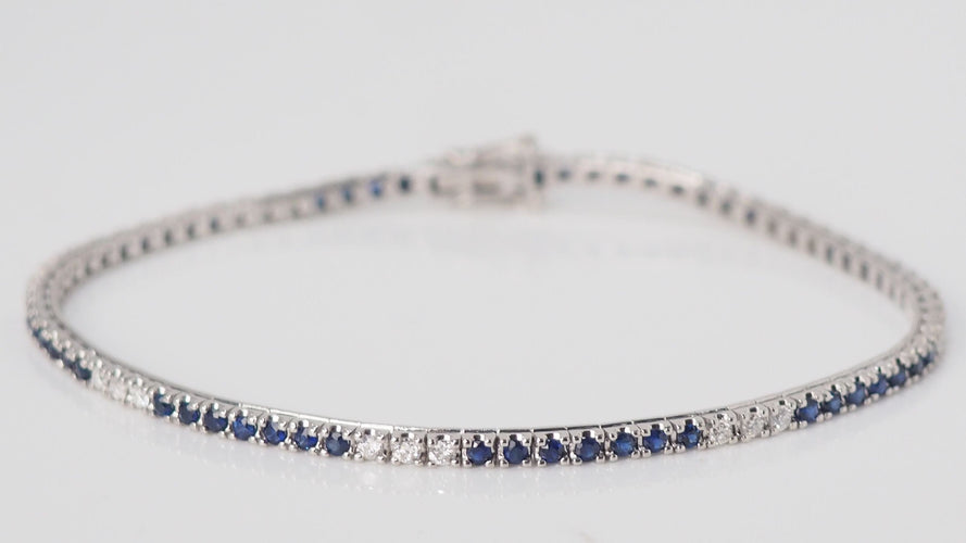 Bracelet Bracelet en or blanc saphirs et diamants 58 Facettes 32236