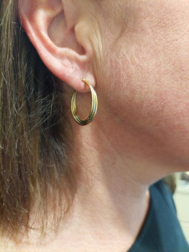 Boucles d'oreilles CRÉOLES TORSADÉES 58 Facettes 073221