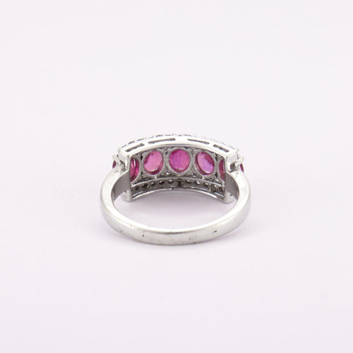 Bague 55 Bague Jarretière, rubis et diamants 58 Facettes