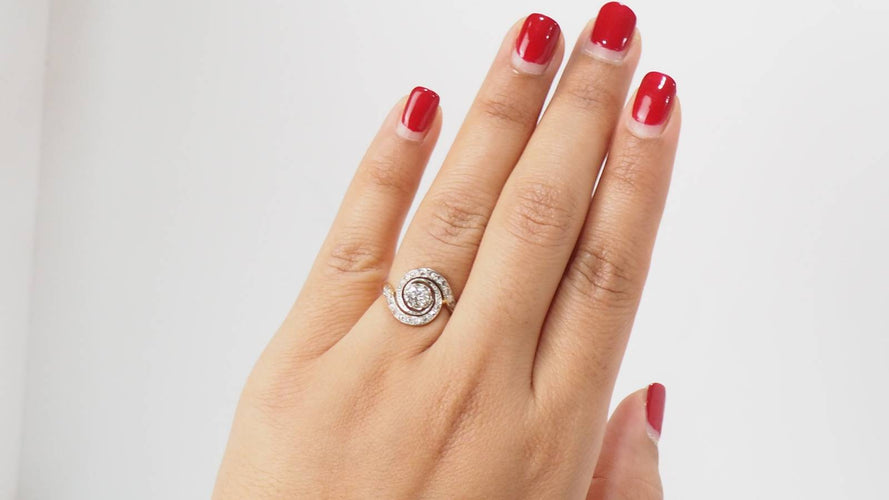 Bague Bague tourbillon en or bicolore et diamants 58 Facettes 31338