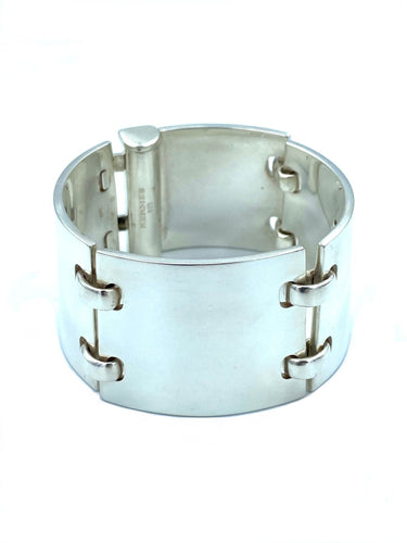 Bracelet HERMÈS. Bracelet manchette articulée argent 58 Facettes