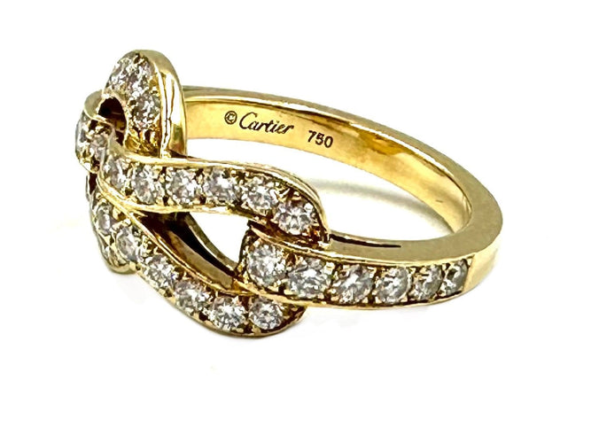 Bague 52 CARTIER. Collection Agrafe, bague en or jaune et diamants 58 Facettes
