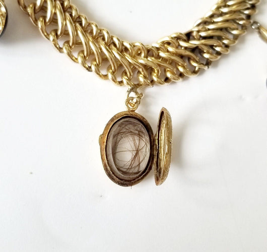 Bracelet Bracelet maille américaine or jaune et breloques 58 Facettes