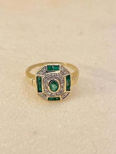 Bague 55 Bague 2 ors, émeraudes et diamants 58 Facettes