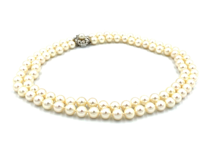 Collier Collier double rangs perles, fermoir or blanc et diamants 58 Facettes