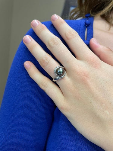 Bague 50 BAGUE TOURBILLON PERLE DE TAHITI ET DIAMANTS 58 Facettes 056421