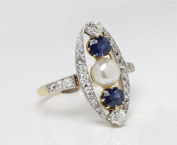 Bague 55 Bague marquise Belle Epoque, diamant, saphirs et perle fine 58 Facettes