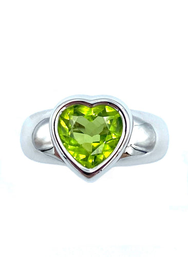 Bague PIAGET. Bague or blanc 18K et péridot 58 Facettes