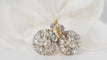 Boucles d'oreilles Dormeuses en or bicolore serties de diamants 58 Facettes 31425