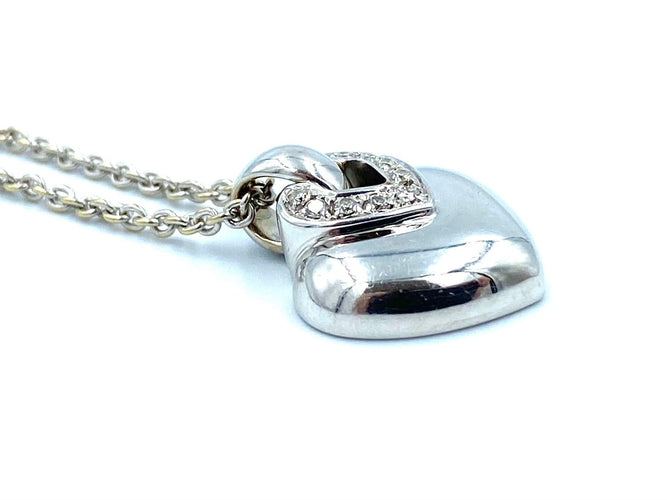Collier Bvlgari. Pendentif Doppio Cuore or blanc et diamants 58 Facettes