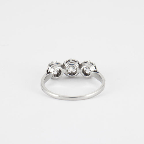 Bague 57 Bague trilogie, or blanc et diamants 58 Facettes P10L8