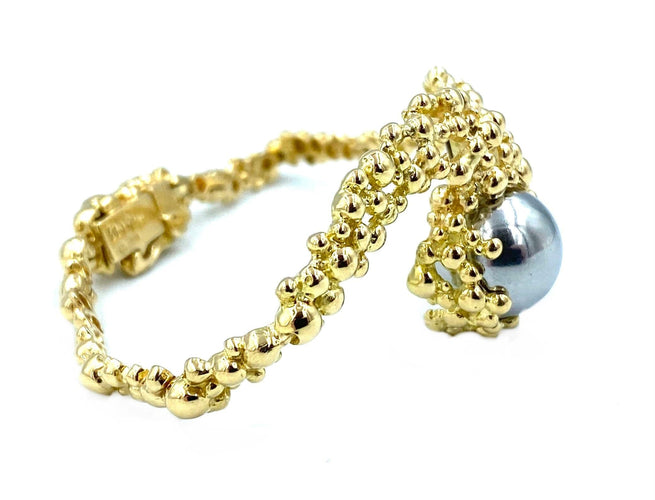 Bracelet GILBERT ALBERT. Bracelet en or jaune et billes interchangeables 58 Facettes