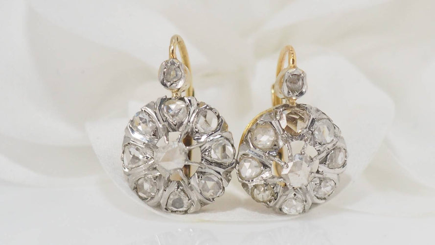 Boucles d'oreilles Dormeuses en or bicolore serties de diamants 58 Facettes 31425