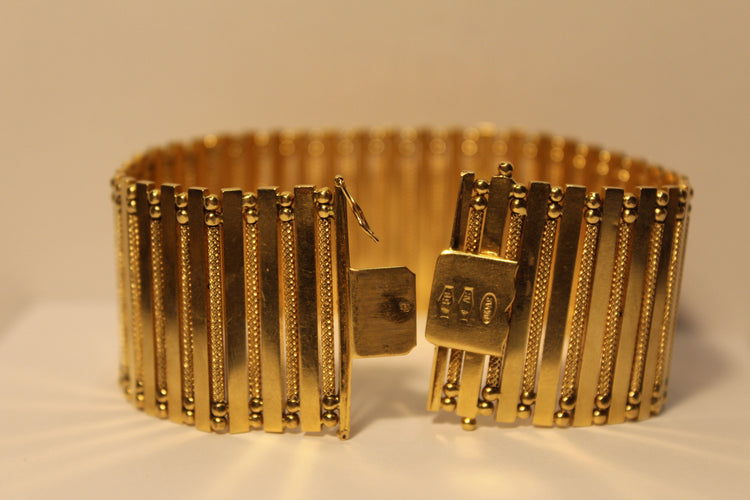 Bracelet Bracelet Manchette Or jaune 58 Facettes 11048