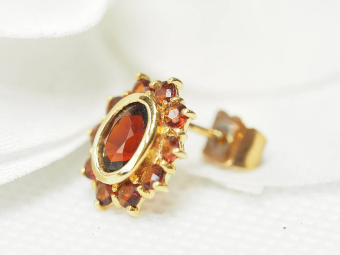 Boucles d'oreilles Boucles d'oreilles marguerite or jaune et grenats 58 Facettes 25806