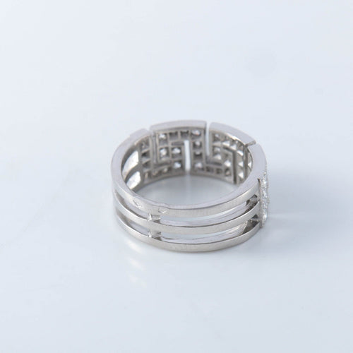 Bague 54 Bague à motifs grecs, diamants et platine 58 Facettes