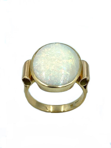 Bague Bague vers 1940 or jaune et opale 58 Facettes