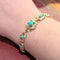 Bracelet Bracelet or jaune et Turquoises 58 Facettes 27765