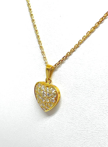 Pendentif Chaîne et pendentif cœur en or jaune et diamants 58 Facettes