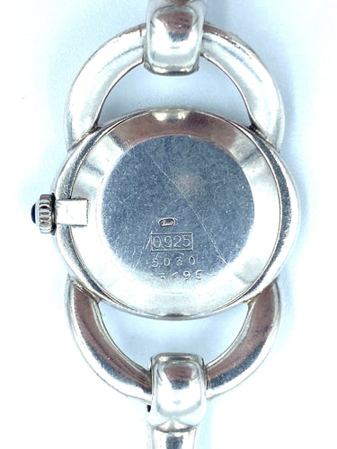 Montre CHOPARD. Montre vintage argent et mouvement mécanique 58 Facettes