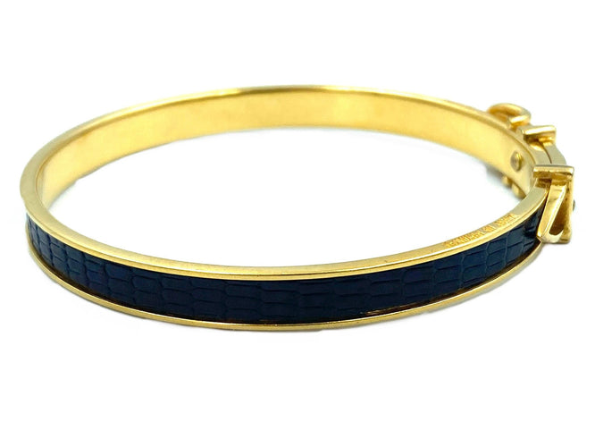 Bracelet Hermès. Bracelet jonc métal doré et cuir 58 Facettes