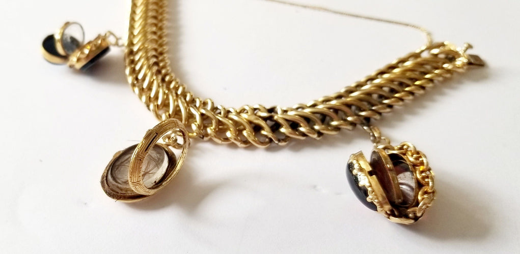 Bracelet Bracelet maille américaine or jaune et breloques 58 Facettes