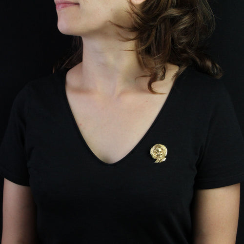 Broche Broche ancienne en or portait d'enfant 58 Facettes 22-323