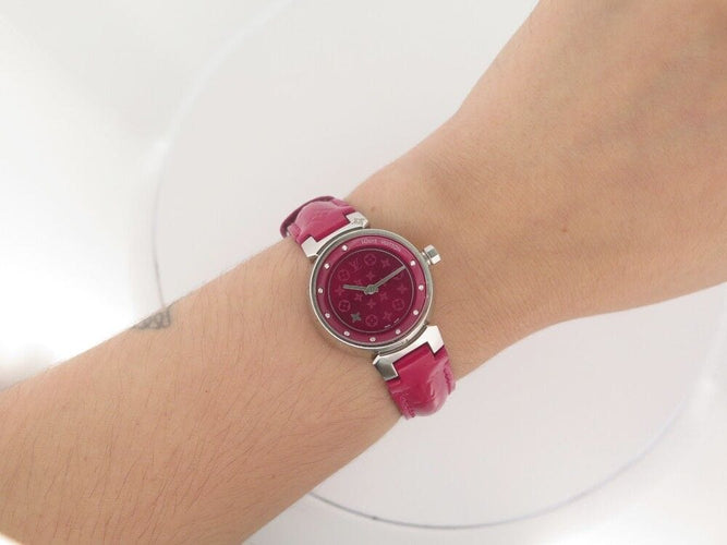 Montre montre LOUIS VUITTON tambour q12mc en acier 28 mm quartz lady 58 Facettes 254178