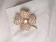 Broche vintage broche VAN CLEEF & ARPELS cosmos or jaune 18k diamants 3.65ct 58 Facettes 250924