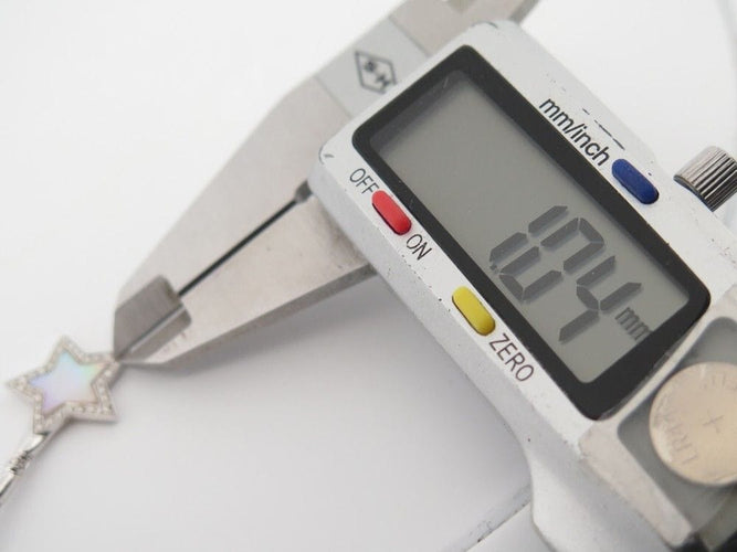 Pendentif pendentif VICTORIA CASAL etoile nacre or blanc 18k 41 diamants 0.24ct 58 Facettes 253612