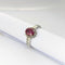 Bague Bague marguerite en or blanc diamants et rubis 58 Facettes 21254