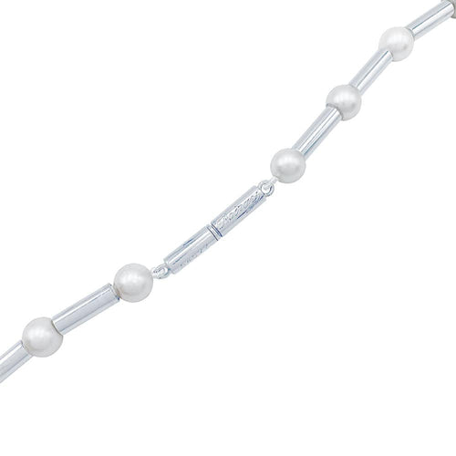 Collier Collier Poiray, Fuseau, or blanc, perles. 58 Facettes 32428