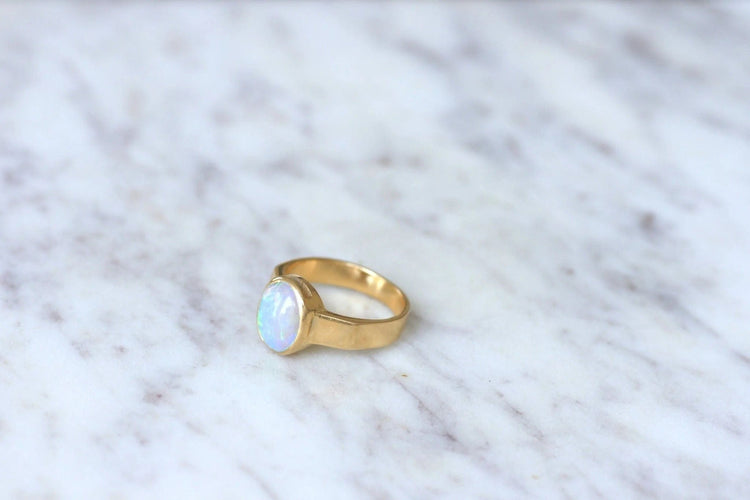 Bague Bague or et opale cabochon 58 Facettes