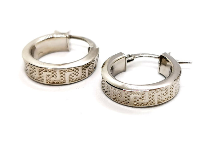 Boucles d'oreilles Boucles d'oreilles Créoles Or blanc 58 Facettes 1048319CD