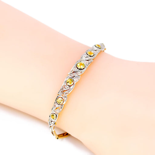 Bracelet Bracelet Saphirs jaunes, diamants 58 Facettes 5C782956A7AE4E1D9B6EA703B0EE1694