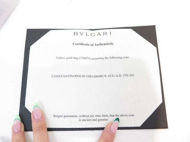 Bague 47 bague BULGARI t47 monete piece antique en or jaune 18k 58 Facettes 249784