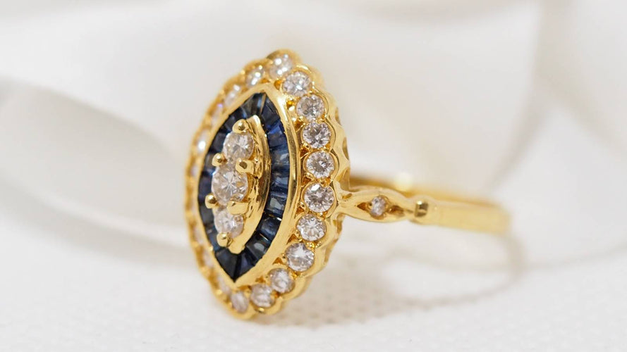 Bague Bague marquise or jaune saphirs calibrés et diamants 58 Facettes 30778