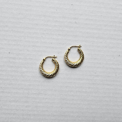 Boucles d'oreilles Boucles d’oreilles créoles torsadées Or jaune 58 Facettes