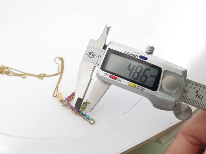 Collier collier pendentif DOLCE & GABBANA breloque f rainbow t50 or jaune 58 Facettes 250337