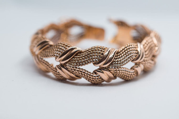 Bracelet Bracelet en or 18 carats année 1960 58 Facettes