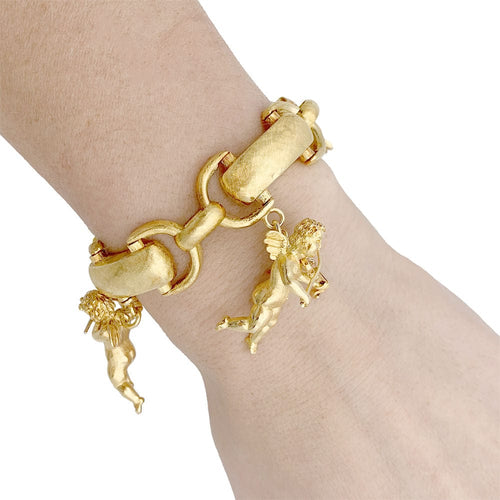 Bracelet Bracelet vintage, "Chérubins Musiciens", or jaune. 58 Facettes 33341