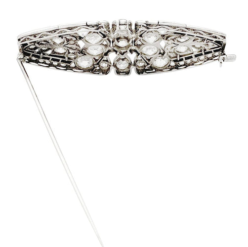 Broche Broche Art Déco en platine sertie de diamants et d'onyx. 58 Facettes 32080