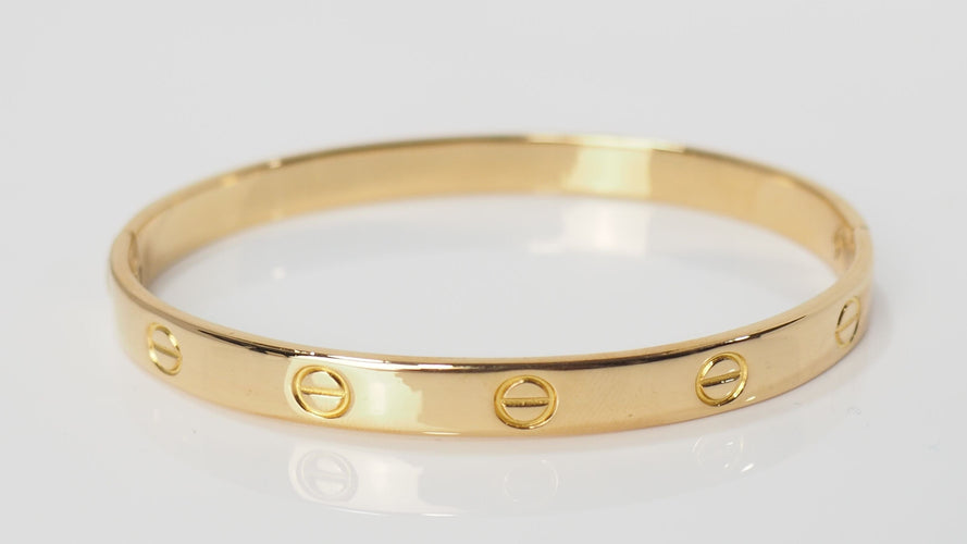 Bracelet 18 Bracelet Cartier Love "vintage" en or jaune 58 Facettes 32199
