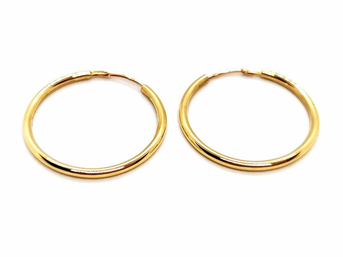 Boucles d'oreilles Boucles d'oreilles Créoles Or jaune 58 Facettes 1732456CN