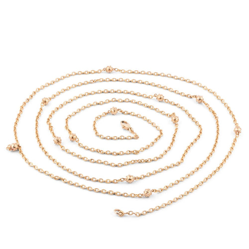 Collier Sautoir ancien en or jaune orné de petites boules 58 Facettes 1