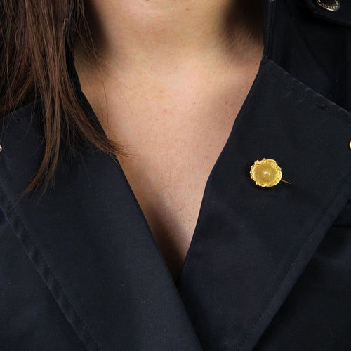 Broche Broche ronde or jaune perle 58 Facettes 18-057